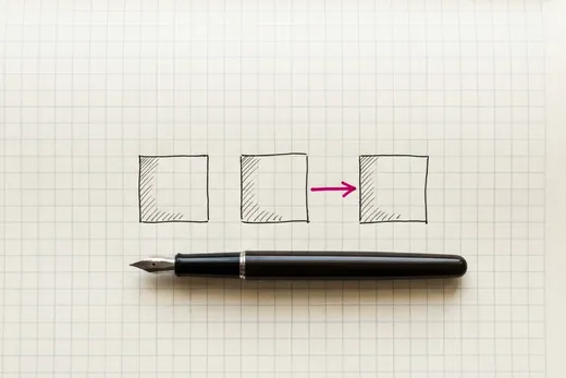 Ink sketch of a fountain pen resting on grid paper beside a half-drawn diagram of three boxes, with the final arrow still being drawn in pink ink
