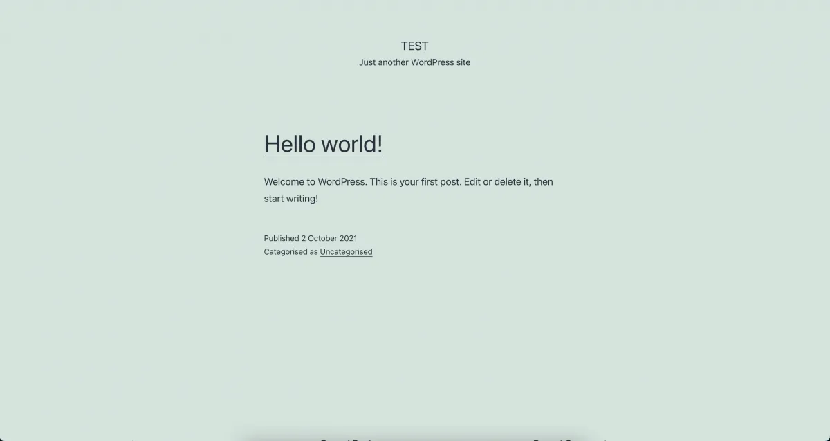 The freshly installed WordPress site showing the default Hello world! post